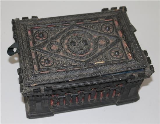 A Staunton ebony and boxwood chess set by Jaques of London, in carton pierre casket, (a.f.).